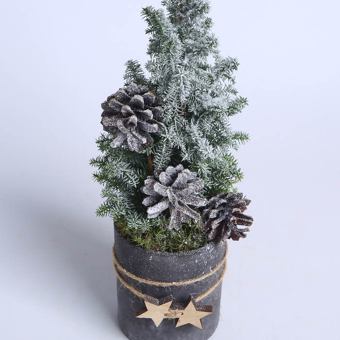 Елка в кашпо заснеженая